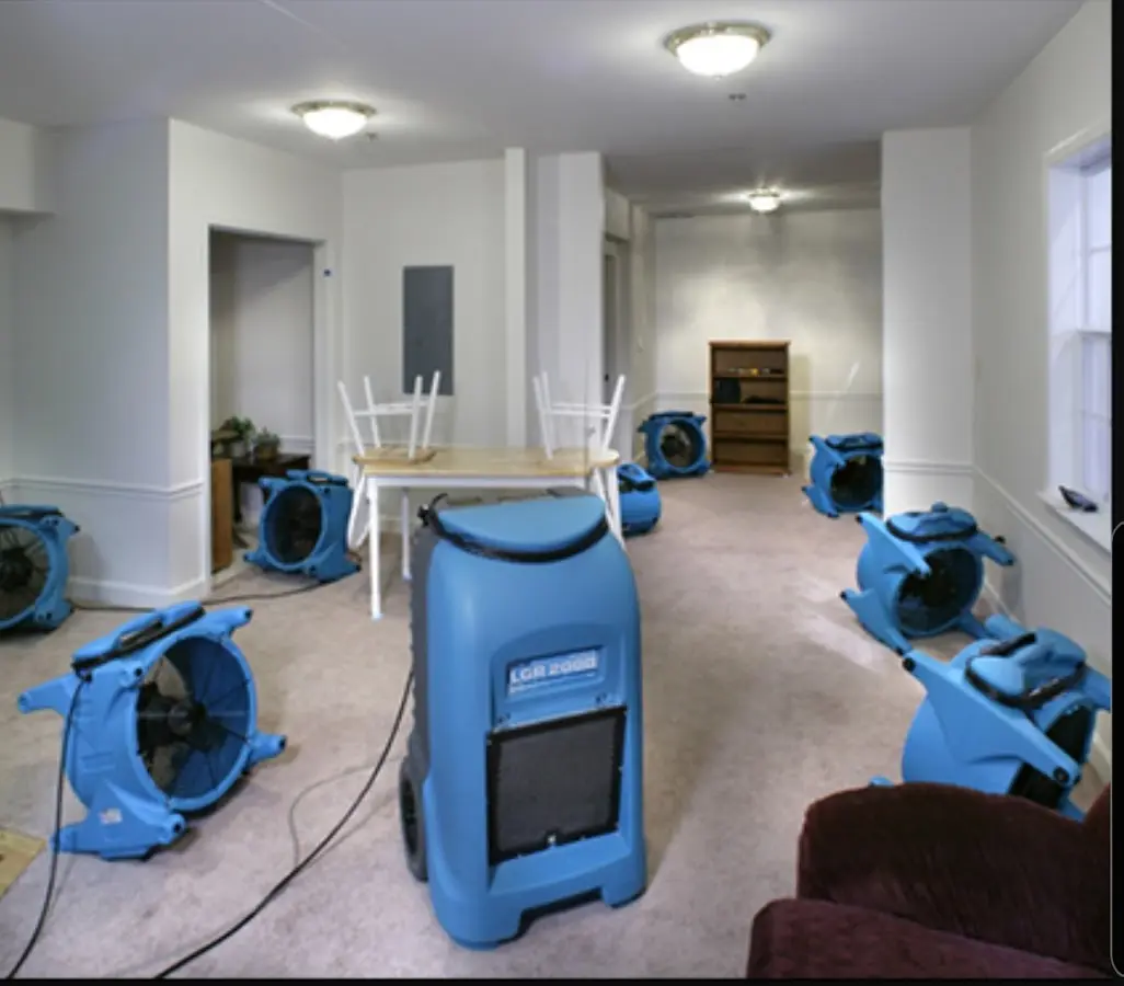 Air movers and dehumidifier setup for Water Damage Restoration in Bear